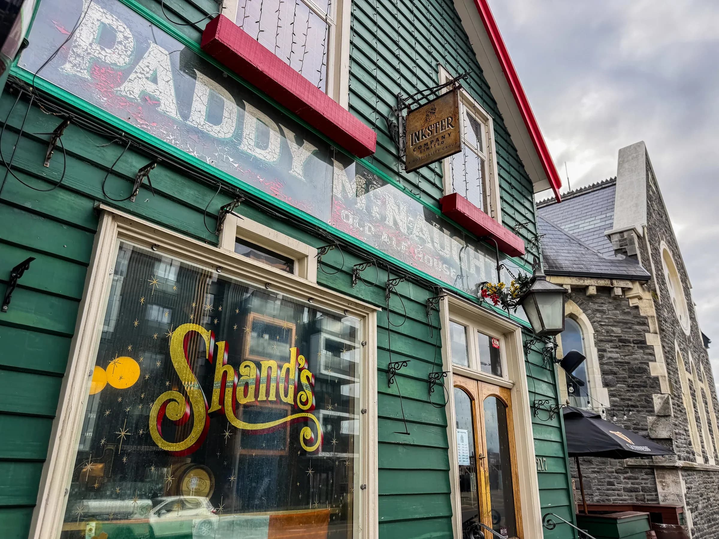 Paddy McNaughton’s green frontage and painted Shand’s window.
